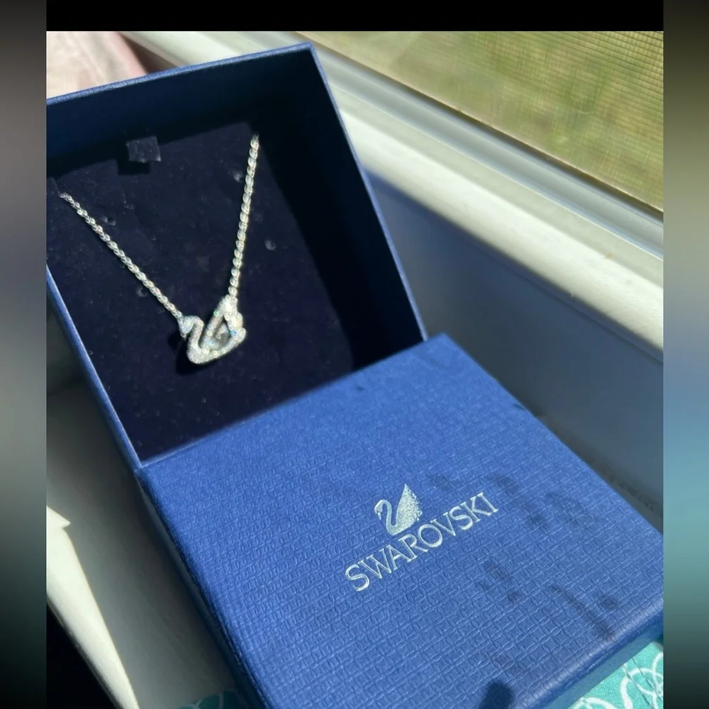 - Swan necklace white rhodium plated from swarovski